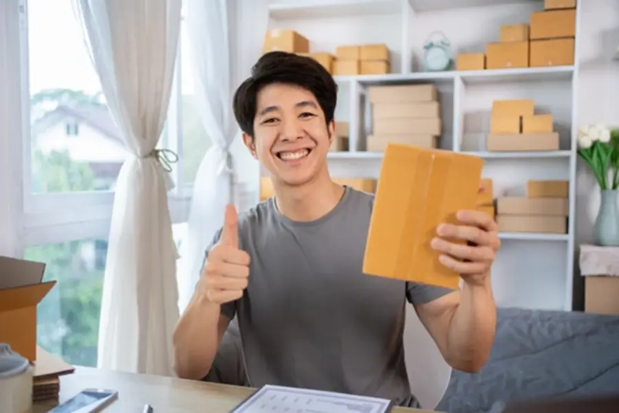A logistics staff member ready to ship a gift from Singapore to Malaysia